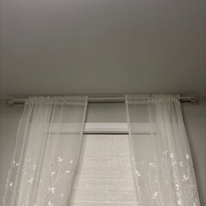 Set of Two New White Curtain Rods 48’ to 84’ with Twisted Cage Finials